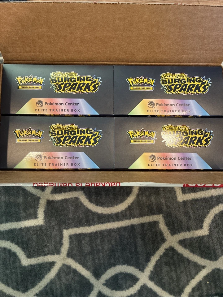 Surging Sparks PC ETB Empty  Lot Of 4 *No Packs* - Image 1 of 1