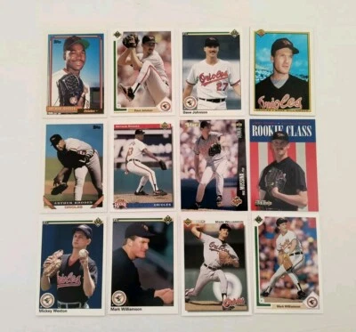 Lote de tarjetas de novato Orioles RC 1992 Topps Arthur Rhodes 771 1996 Mike Mussina Foto 1 de 4