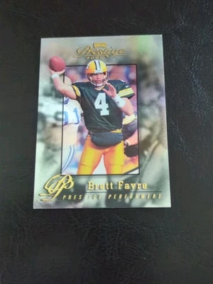 2000 Playoff Prestige Brett Favre PREDTIGE PERFORMERS /2500 card #215 - Image 1 of 4