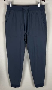 Lululemon Joggers Mens Large Dark Gray City Sweat Tapered Pants Zip Pocket Tech - Picture 1 of 5