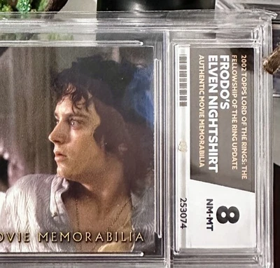 Lord of the Rings FOTR: "Frodo’s Elven Nightshirt” Costume Card - Image 1 of 4