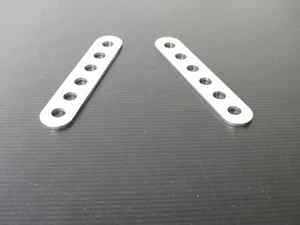 Par de soportes silenciadores universales perforados de 4 pulgadas acero inoxidable Triumph Norton Bsa - Imagen 1 de 5