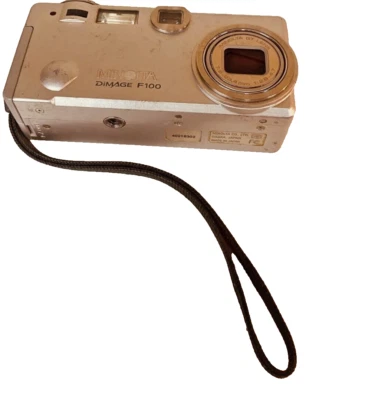 Minolta Dimage F100 Digital Camera 4.0 Mega Pixals Silver WORKING Tested - Image 1 of 3