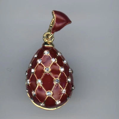 Pendentif Oeuf Argenté Rouge Avec Un Réseau De Cristal À L'extérieur - Photo 1/2