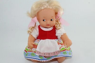 FAMOSA BARRIGUITAS RUBIA CON TRENZAS ALEMANIA OJOS AZULES 97 EN LA NUCA - Imagen 1 de 3