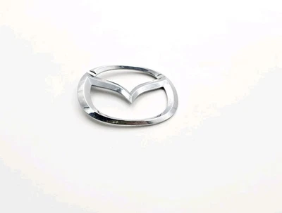 2001-2002 Mazda Millenia parrilla delantera emblema logotipo insignia signo símbolo cromo Foto 1 de 3