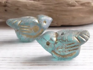 2 - 22x12mm CZECH MATTE PALE BLUE SUBTLE AB GOLD WASH SPARROW BIRD TOTEM BEADS - Picture 1 of 3