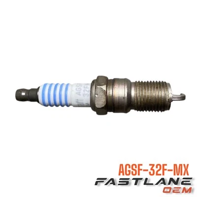 Bujía Ford Taurus 1993-2007 nueva OEM AGSF-32F-MX Foto 1 de 4