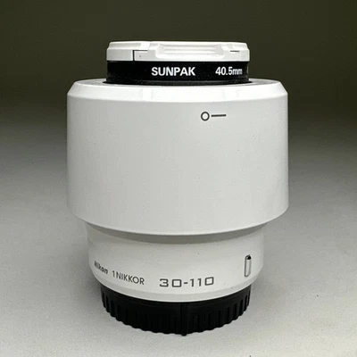 Nikon 1 NIKKOR 30-110mm f/3.8-5.6 VR  Lens (White) + Front & Back Lens Caps - Image 1 of 4