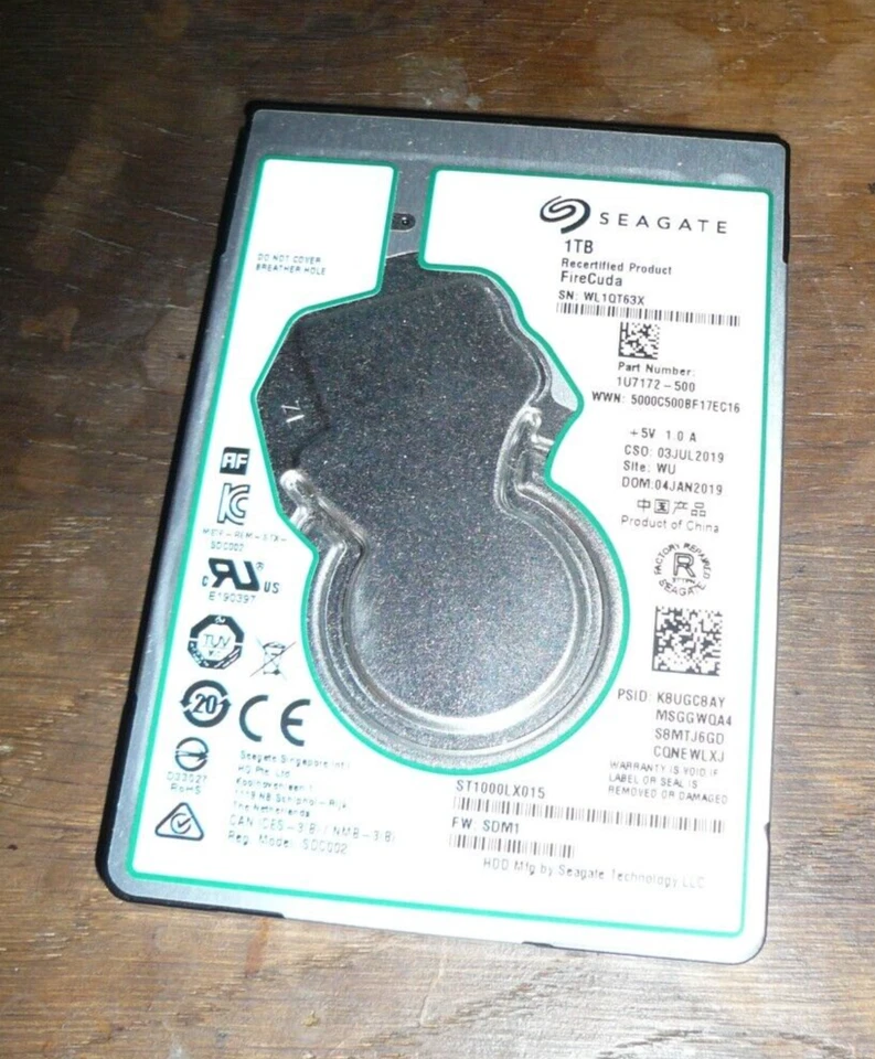 Disque dur Hybride Seagate FireCuda SSHD 2,5" 1 To 8Go SSD SATA ST1000LX015 - Photo 1/1