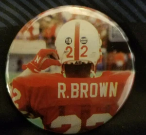 NEBRASKA CORNHUSKERS R. MARRÓN #22 BOTÓN PINBACK - Imagen 1 de 1