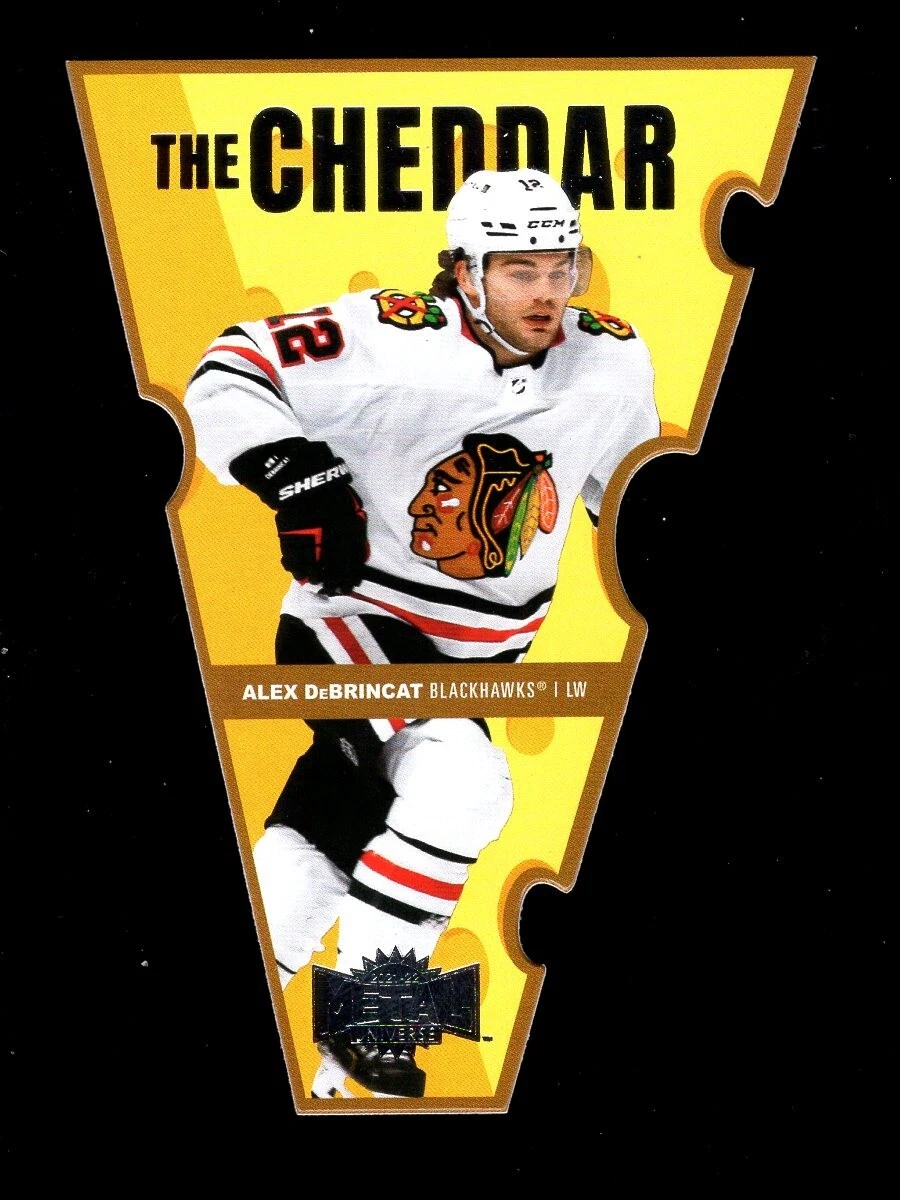 2021-22 METAL UNIVERSE THE CHEDDAR TC15 ALEX DeBRINCAT BLACKHAWKS