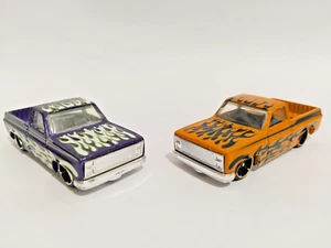Lot Of 2 Hot Wheels ‘83 Chevy Silverado Purple Flames AND Orange Flames - Picture 1 of 10
