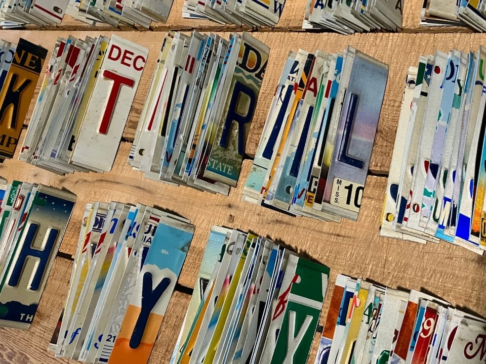 Bulk Worn & Faded Embossed Only License Plate Letters and Numbers - 25 Pieces - Image 1 of 1