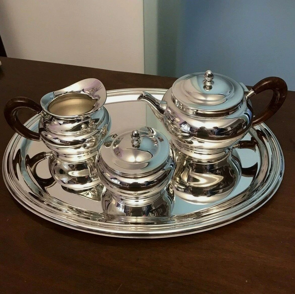 Stupendo servizio da caffè/the in argento 800  - Immagine 1 di 4