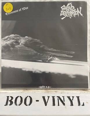 Excrement Of War - Split E.P. Green vinyl 7” record NM / NM - Image 1 of 4