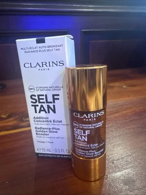 2Clarins Self Tan Radiance-Plus Golden Glow Booster para rostro 0,5 fl. oz. Foto 1 de 4