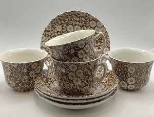 "4-1960 Calico Brown, Staffordshire, Inglaterra 2 tazas de 5/8"" y platillos planos de 5,75""" - Imagen 1 de 7
