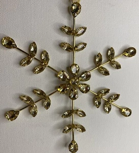 Dekoratives Schneeflocken-Ornament mit Schmucksteinen Made in India - Bild 1 von 9