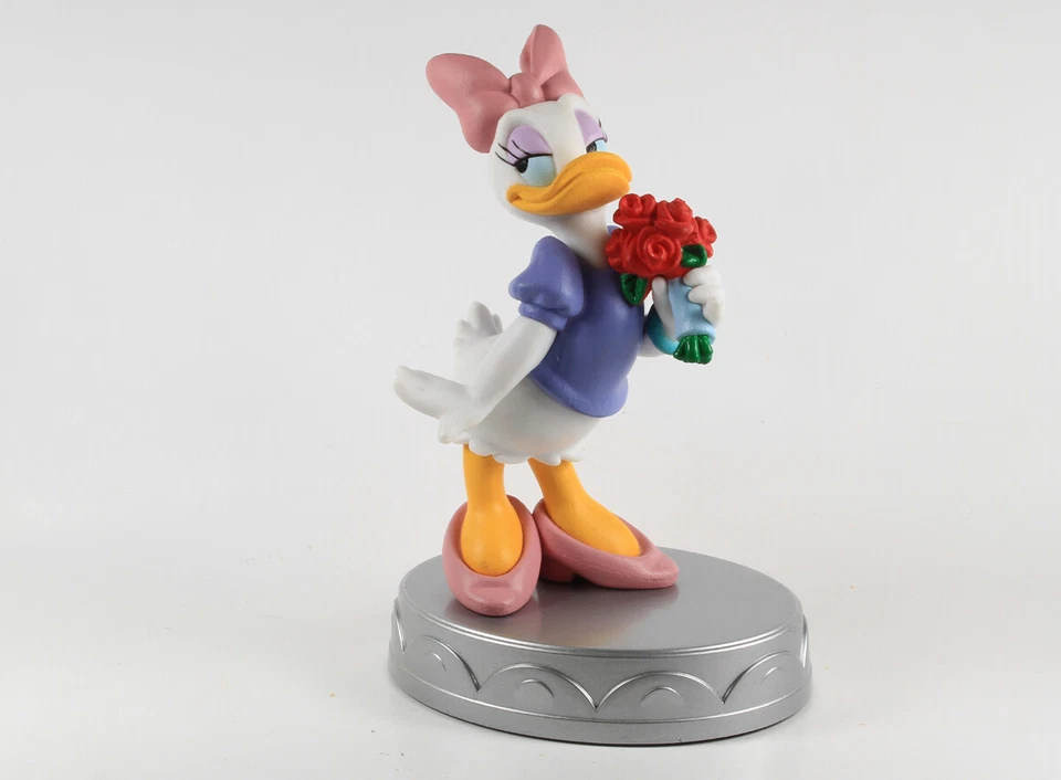 Daisy Duck mit Rose Sockel === Walt Disney De Agostini - Bild 1 von 1