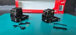Herpa 2-Achs SZM Actros Gigaspace schwarz unbespielt 1:87 - Bild 1 von 6