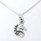 Various silver coloured extendable chain necklaces with nature themed charms
