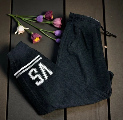 Calça de moletom Victoria's Secret cinza escuro tamanho M bolsos cordão 26" costura interna - Imagem 1 de 4