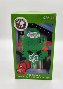 NEW GRINCH LED Light Show PROJECTOR Whirl-A-Motion Outdoor Christmas Yard Décor - Picture 1 of 4