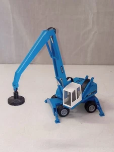 Conrad Maßstab 1:50 Fuchs 2842 Altmetall Umschlagbagger mit Magnet - Bild 1 von 10