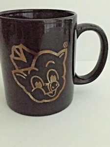 Taza de café negra con gráficos dorados Piggly Wiggly Grocery Store 3 1/4"D - Imagen 1 de 9