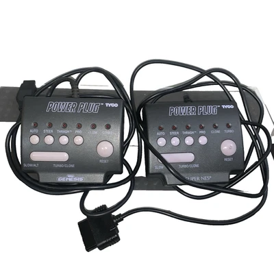 TYCO Power Plug Lot One Super Nintendo SNES & One Sega Genesis (For Controllers) - Image 1 of 4