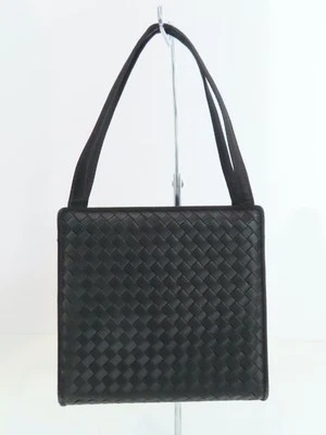 Bolso de Mano Bottega Veneta Negro Satinado Intrecciato Tejido Pequeño Doble Asa Superior Foto 1 de 4