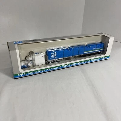 SpecCast 32005 PPG 1:64 Kenworth W900 W/ Multi-axle Flatbed Trailer Die Cast - Image 1 of 4