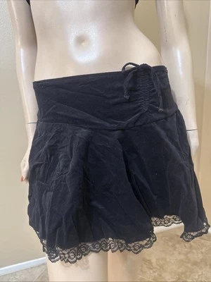 Falda informal de terciopelo de algodón negra elástica acampanada de encaje con cremallera talla L para mujer Foto 1 de 4