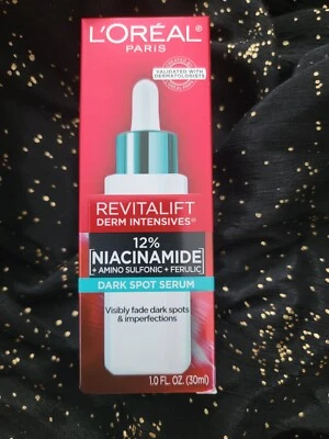 Suero de manchas oscuras ferúlico L’Oréal Paris REVITALIFT 12 % niacinamida amino sulfónico Foto 1 de 4