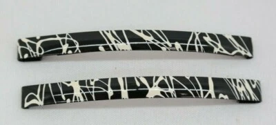 Correas metálicas con patrón de goteo de pintura blanca y negra para caravana TF Foto 1 de 4