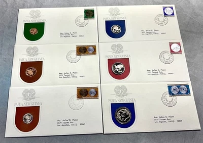Seis cachés de Papúa Nueva Guinea 1975 primer día ~ monedas de prueba + estampillas + álbum original Foto 1 de 4