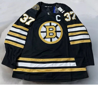 CAMISETA ADIDAS BOSTON BRUINS TALLA 52 $230 PATRICE BERGERON 100º ANN. IM8285 Foto 1 de 4