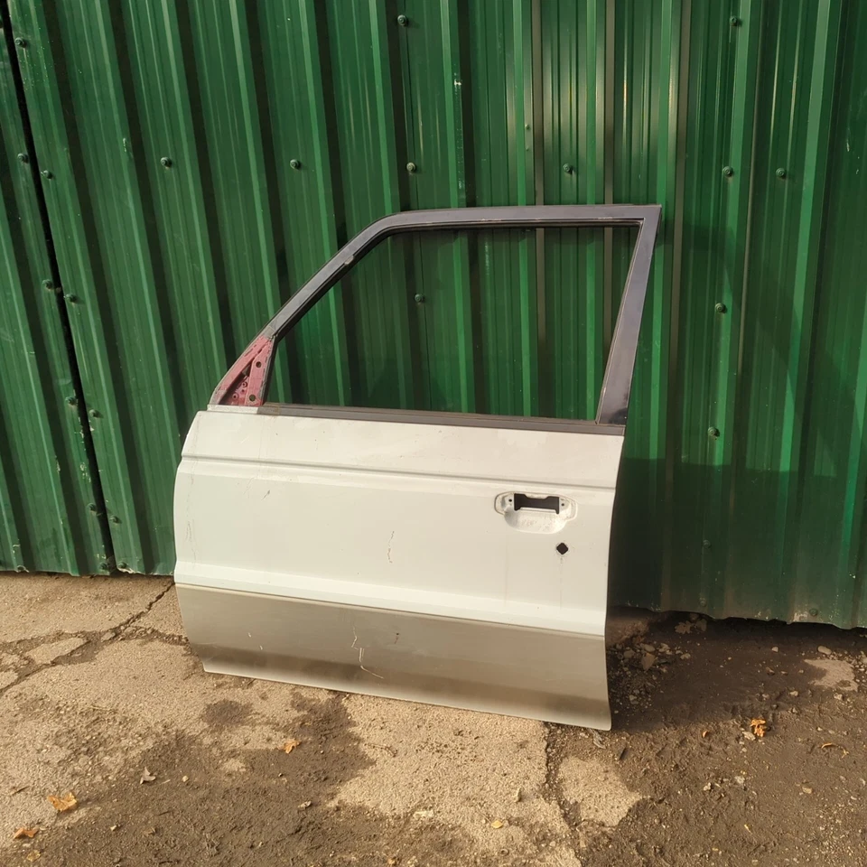 MITSUBISHI SHOGUN PAJERO MK2 PUERTA PASAJERO DELANTERA IZQUIERDA LADO CERCANO BLANCO (OS) Foto 1 de 4