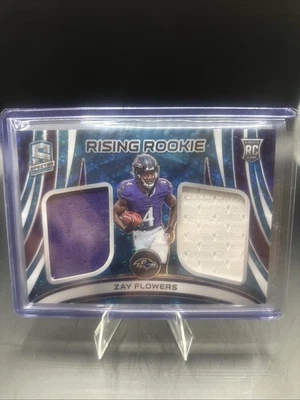 2023 Panini Spectra Rising Rookie Materials Neon Blue Prizm Zay Flowers /50 RC - Image 1 of 2