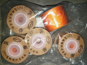 5 SPULEN NEU ORANGE 0,8 mm SCHNUR KONVOLUT NIE GEÖFFNET BASTELSPULEN - Bild 1 von 1