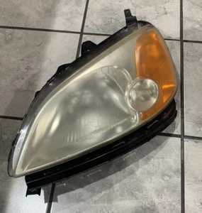 2002 Honda Civic Left Driver Side Front Headlight ￼ - Picture 1 of 5