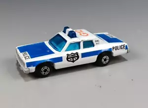 MATCHBOX SUPERFAST Plymouth Gran Fury 1979 POLICE CAR MACAU 1:64 - Picture 1 of 5