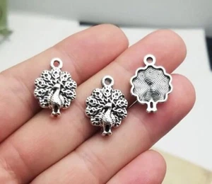 5 X PEACOCK CHARMS BIRD FEATHER ANTIQUE SILVER PLATED KEYRING CRAFT 15x20mm - Picture 1 of 1
