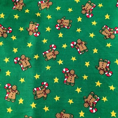 Green Fabric with Gingerbread men and Stars 1 yard - Image 1 of 4