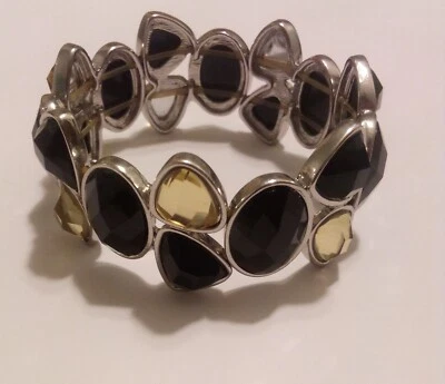 Pulsera negra en tono dorado del mercado negro de la Casa Blanca Foto 1 de 2