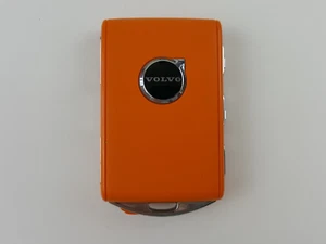 FOR PARTS ONLY ORIGINAL VOLVO OE SMART KEY LESS ENTRY REMOTE ORANGE BLACK LOGO - Picture 1 of 17