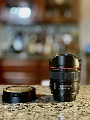 Canon EF 14mm f/2.8L II USM Lens – Sharp Optics, Bent Hood - Image 1 of 4