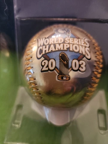 World Series Champions 2003 Gold Baseball On Stand New In the Box Cover