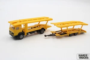 Herpa Iveco Turbo Car transporter yellow/black 1:87 /H24170 - Picture 1 of 1